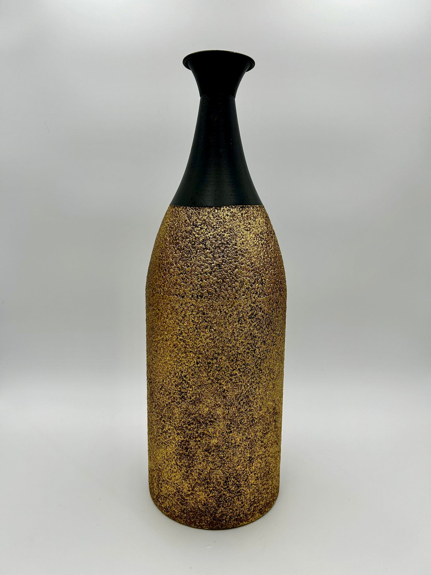 Black and gold long vase